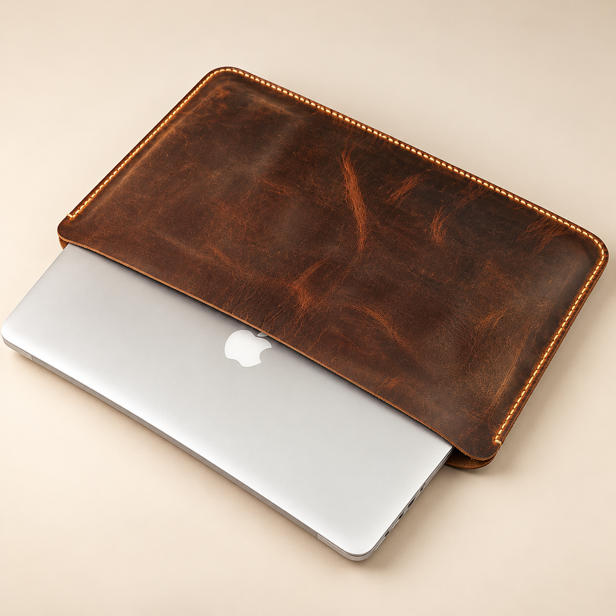 Hand stitched leather MacBook sleeve and laptop detail