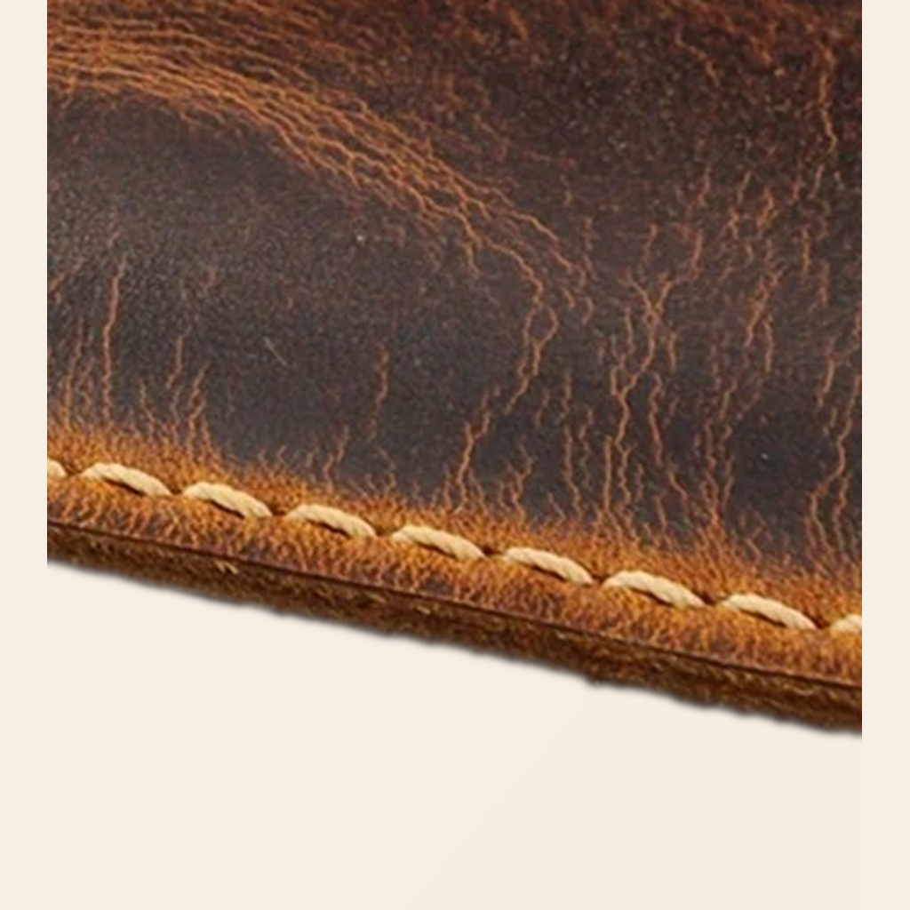 Close-up of distressed top grain brown leather texture