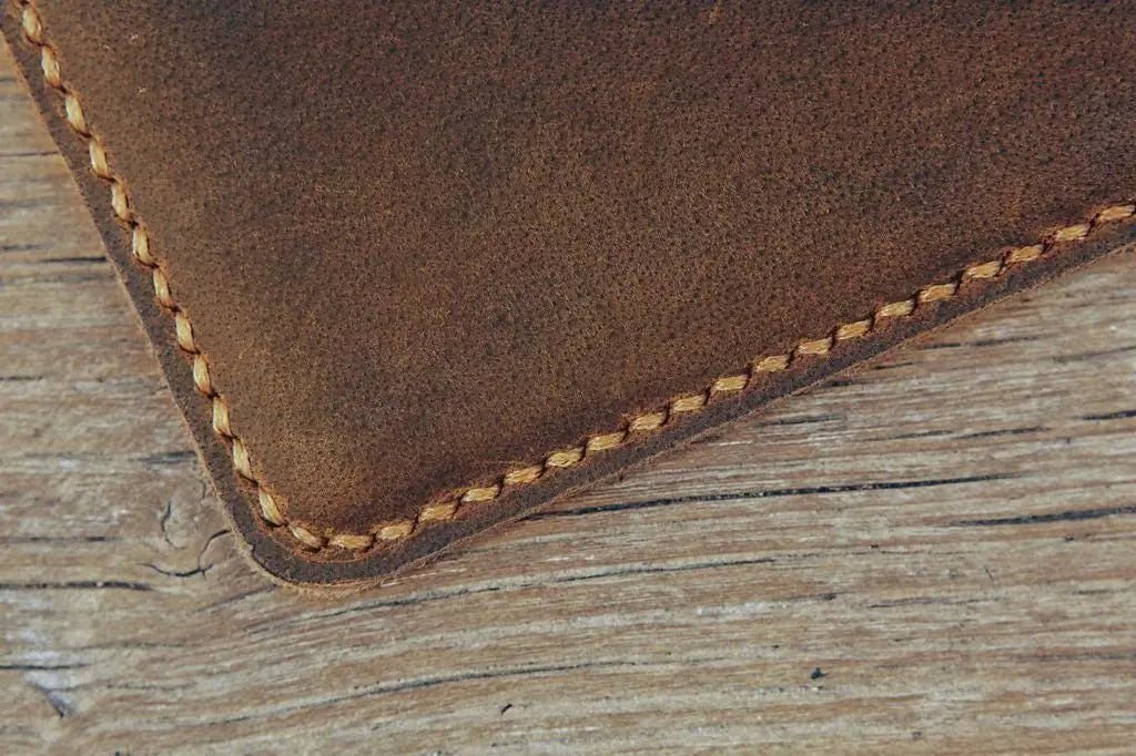 Custom engraving detail on a leather clipboard