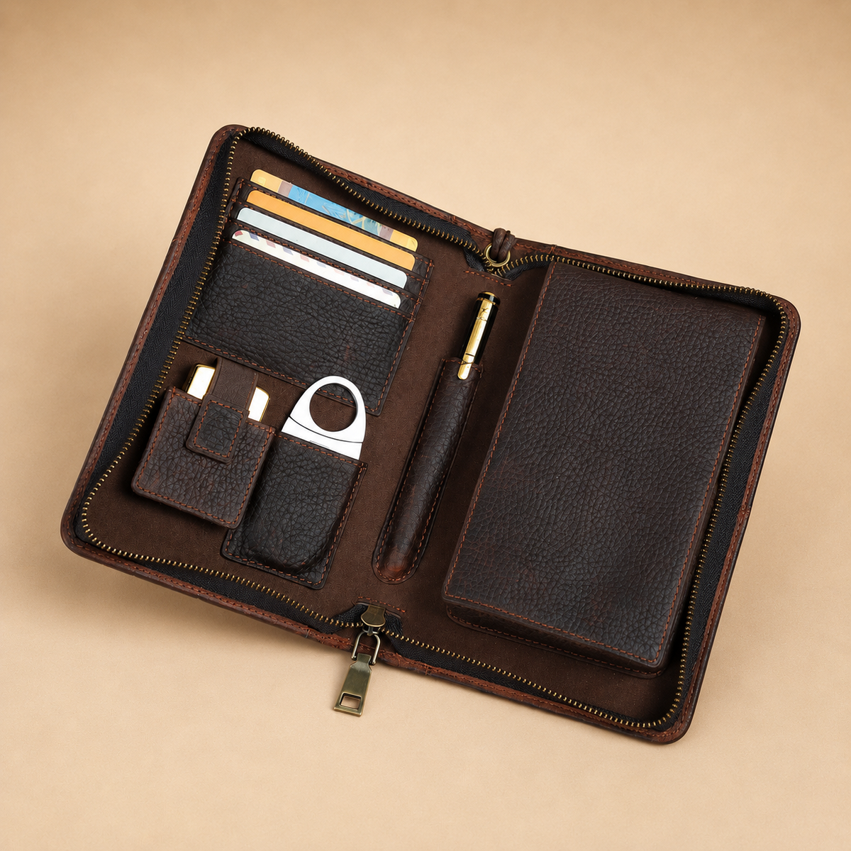 Leather cigar case shown open with lighter and cutter pockets