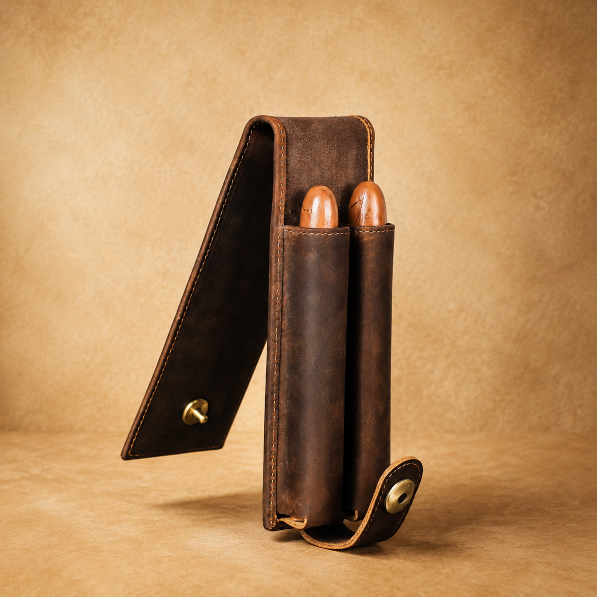 Leather cigar case shown open with protective cigar tubes