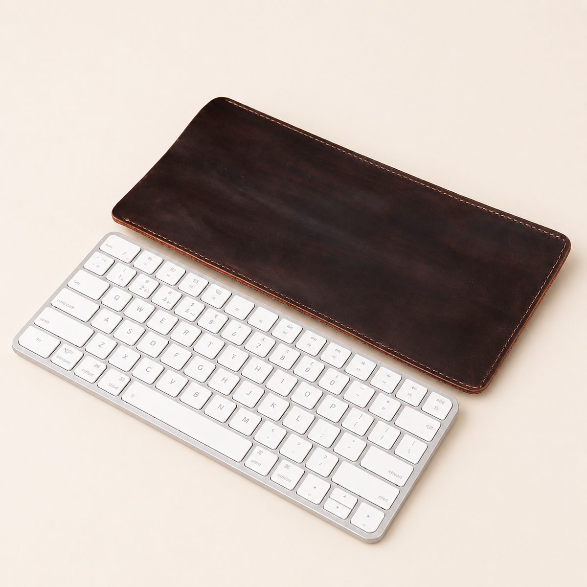 Leather keyboard sleeve shown with keyboard inserted
