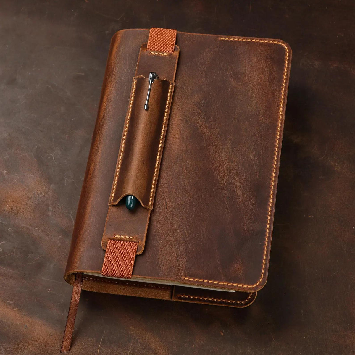 Close-up of custom name engraving on a full-grain leather Bible cover