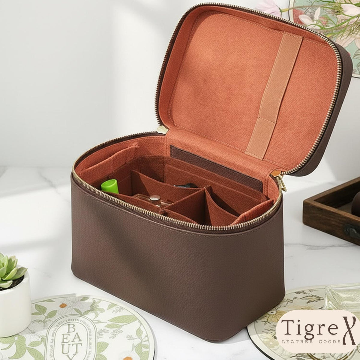 Leather cosmetic bag, hot-stamped monogram detail