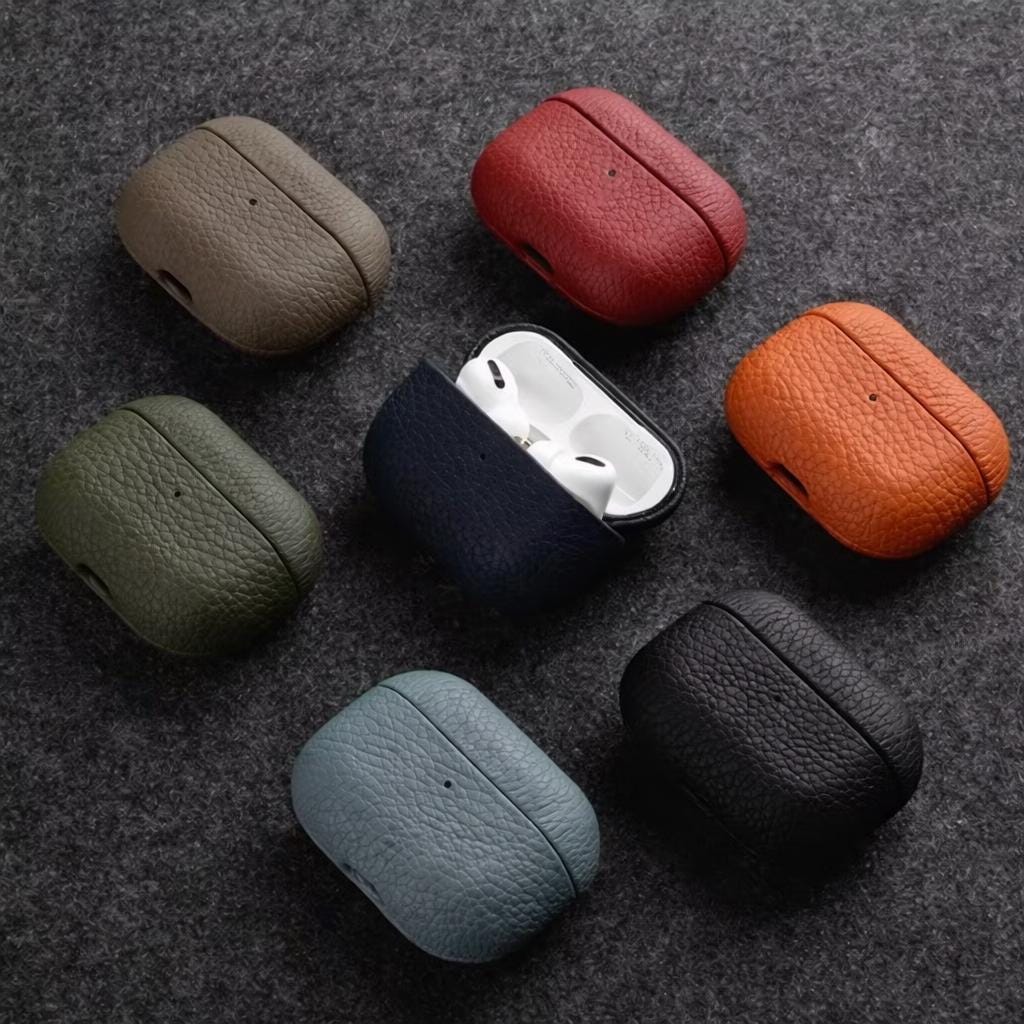 Close-up of cowhide leather texture on an AirPods case