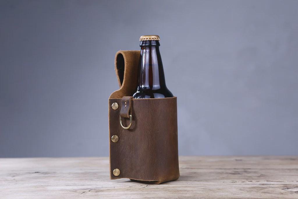 Close-up of bottle opener on a leather beer holster