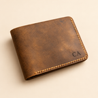 Brown full-grain leather men's bifold wallet personalized with CA laser-engraved initials