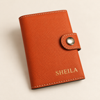 Orange leather card holder with gold personalized name SHEILA and snap closure – TigreX Studio