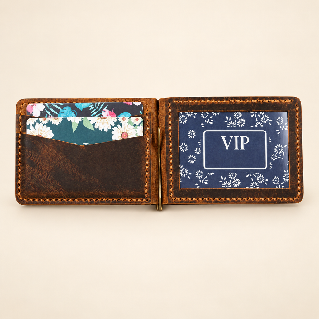 Open distressed full-grain leather wallet with inner card slots and center metal cash clip