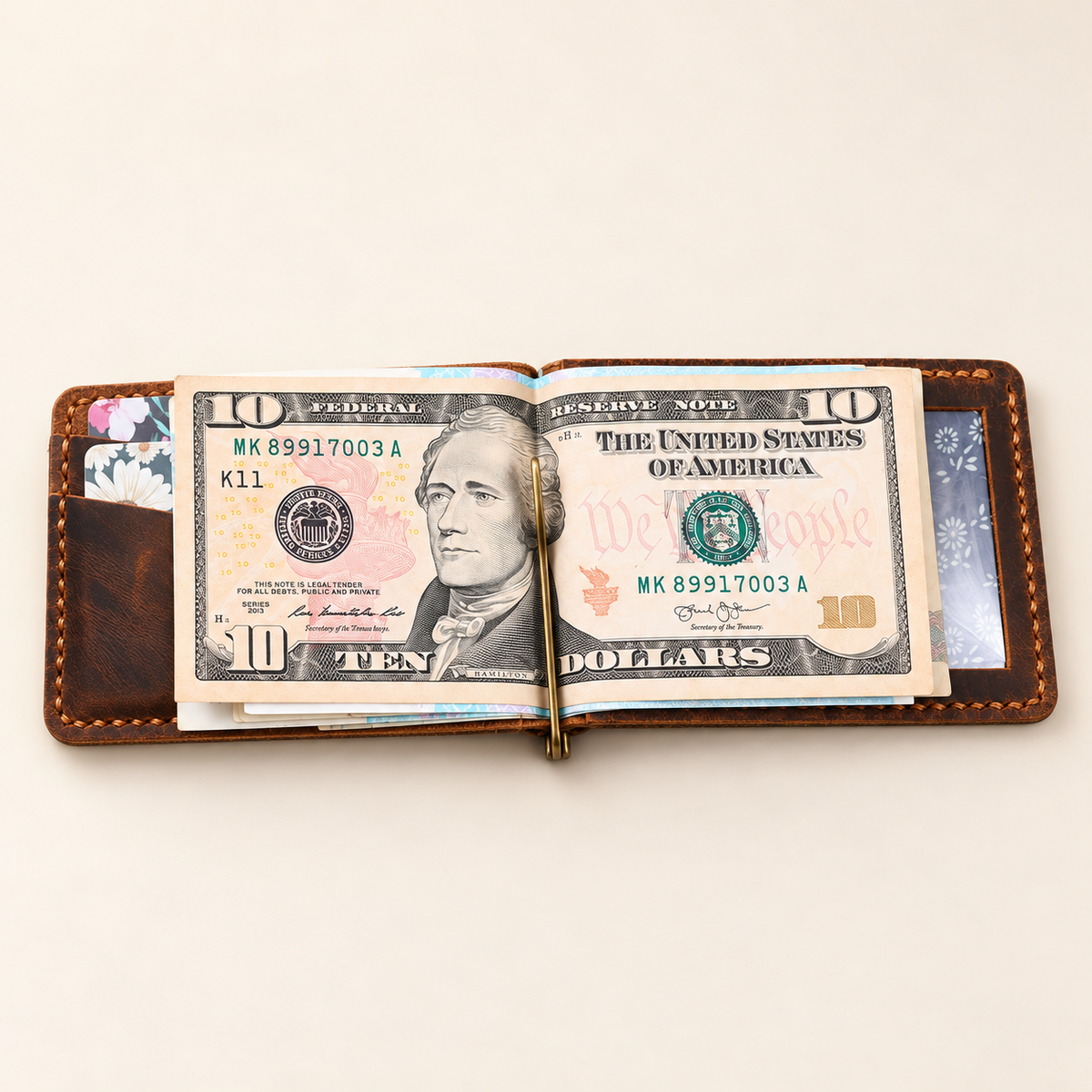 Leather front pocket wallet demonstrating how cash is held by money clip